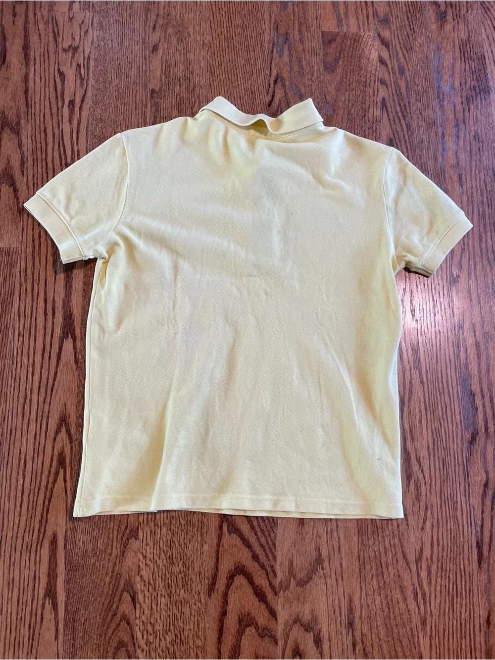 Paul Smith Jr. yellow polo with signature zebra embroidery